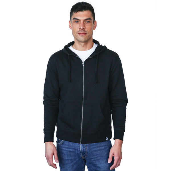 hero hoodie backpack in black worn by a male model